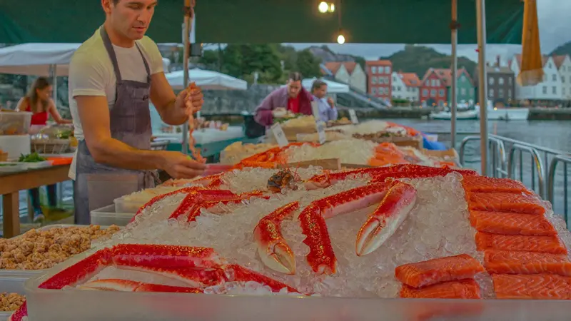 Bergen fish market stall with king crab and salmon on ice